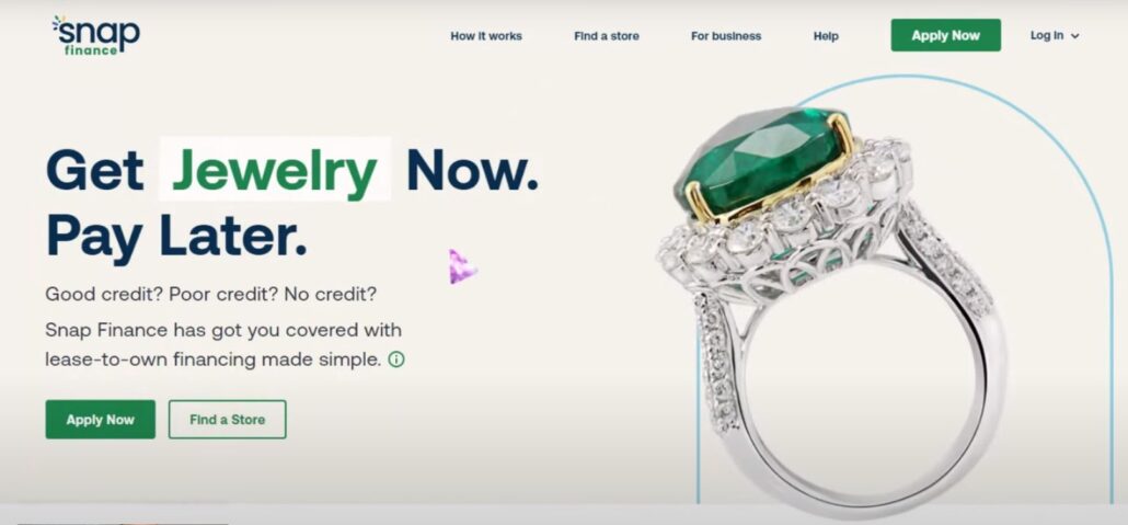 the landing page at the Snap Finance’s main website with a ring and an emerald in it